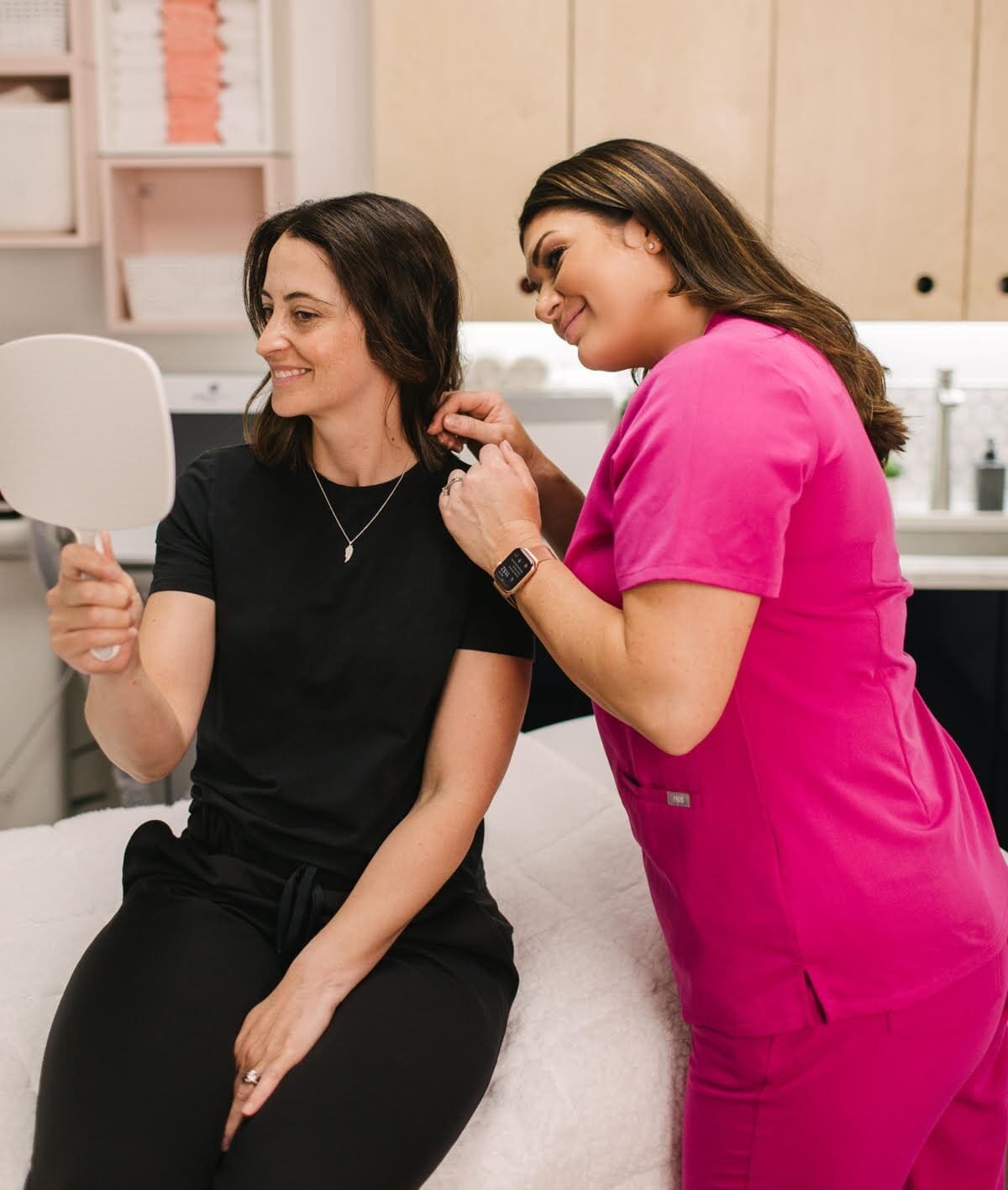 patient checking results in the mirror